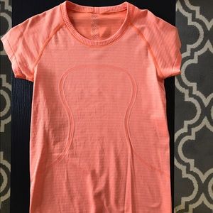 Orange lululemon swiftly tech t